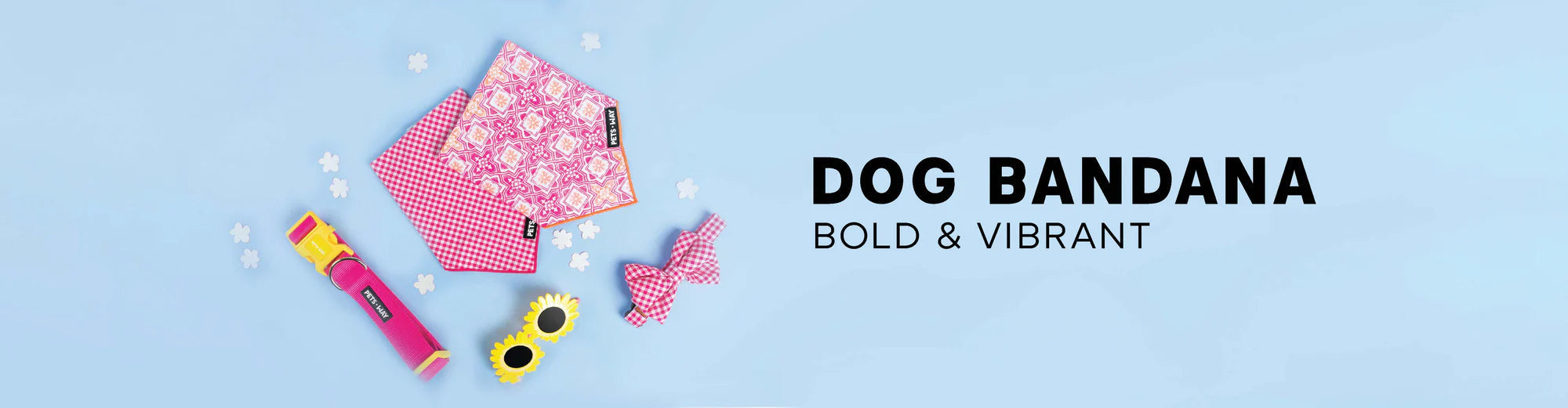 "Pink dog accessories (bandanas, bow tie, collar, sunglasses) on a blue background with 'DOG BANDANA - BOLD & VIBRANT' text."